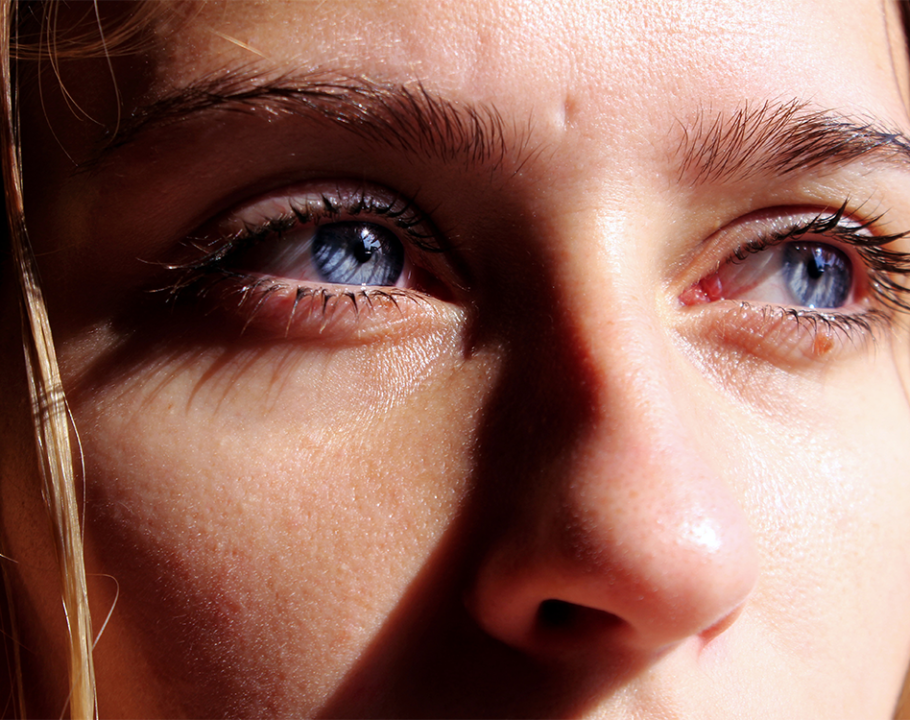 close up of woman's blue eyes