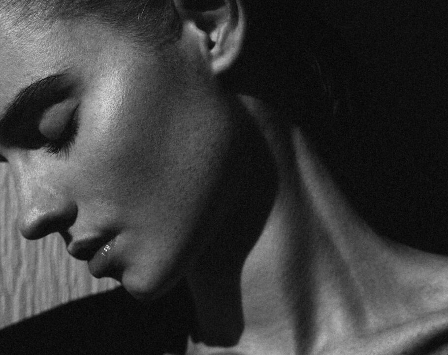 black and white portrait of woman side profile and jawline