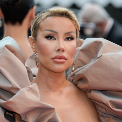 Lisa Opie poses on Cannes red carpet