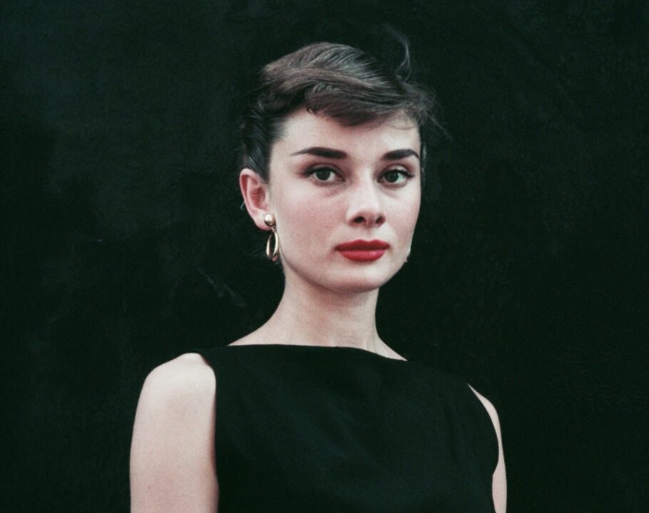 Belgian-born actress Audrey Hepburn (1929 - 1993) in a black sleeveless dress, circa 1955.