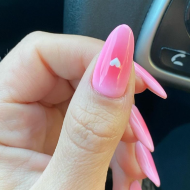 pink airbrushed manicure with hearts