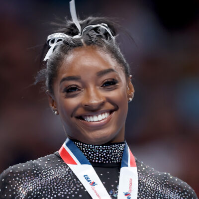 Simone Biles celebrates after placing first in the floor exercise competition on day four of the 2023 U.S. Gymnastics.