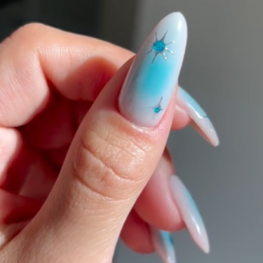 blue airbrushed nails