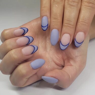 close-up of oval nails with french manicure