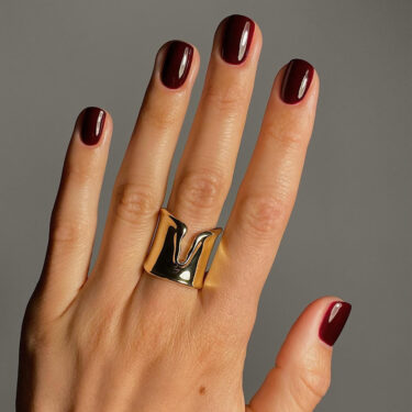 burgundy scorpio nails