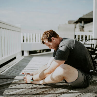 man meditating outdoors