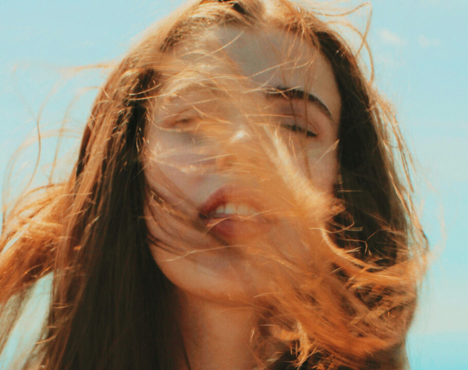 woman with red hair in the wind