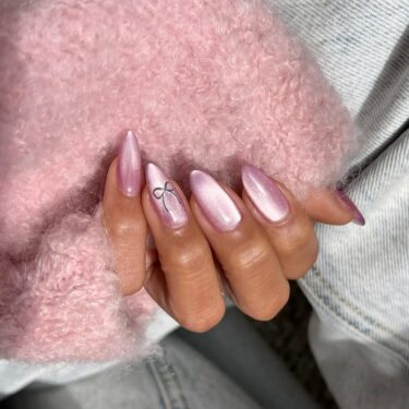 Manicure with pink cat eye nails