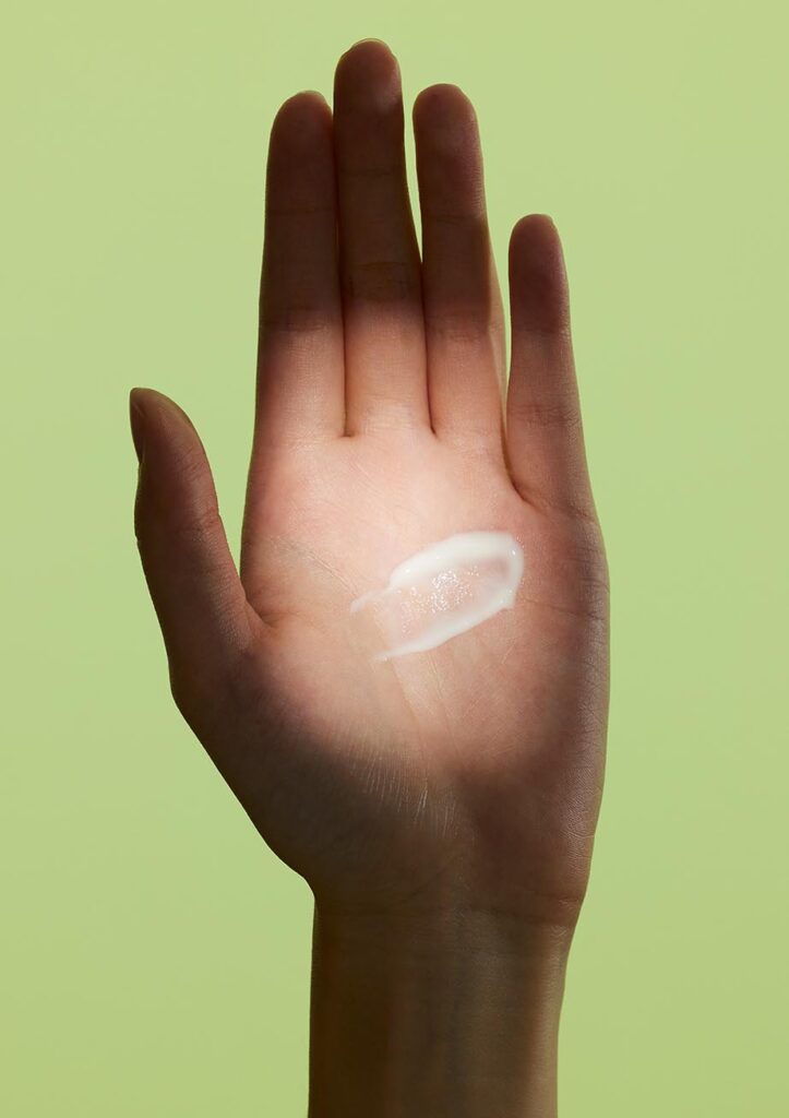 hand with a swab of Mega-Mushroom Dark Spot Brightening Moisturizer on the palm